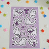 sticker sheet of white cats wearing cute purple ribbon bows