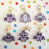 six different keychain designs featuring bats drawn in a cute style
