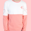 Color block sweatshirt that is white on top and pink on bottom. The neckline has a pink trim. The chest is embroidered with a cat holding a Cupid's bow. The sleeves are embroidered with hearts on the upper arm, and the words "LOVE" and "SHOT!" on the lower forearm area.