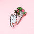 Gold plated hard enamel pin of a white cat holding a big bouquet of flowers